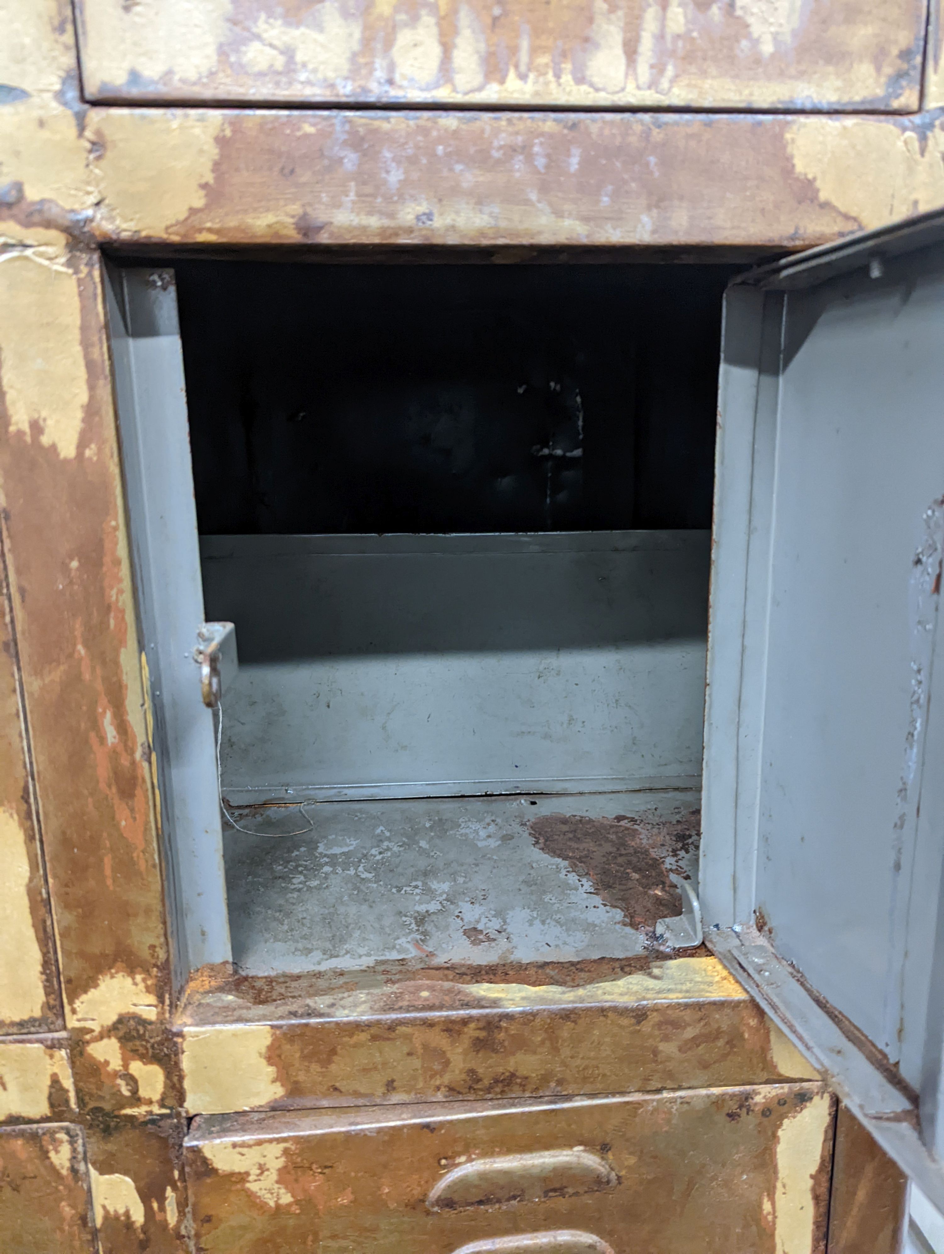 An industrial style metal locker unit. W-91cm, D-49cm, H-198cm.